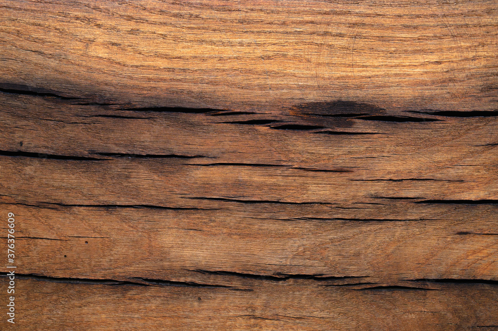 The abstract background of the old wooden surface is wet after rain. The abstract background of the old wooden surface is wet after rain.