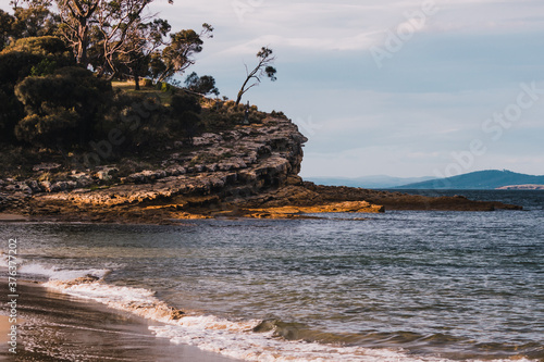 detail of the view from Blackmans Bay beach natural landscape in Tasmania, Australia photo