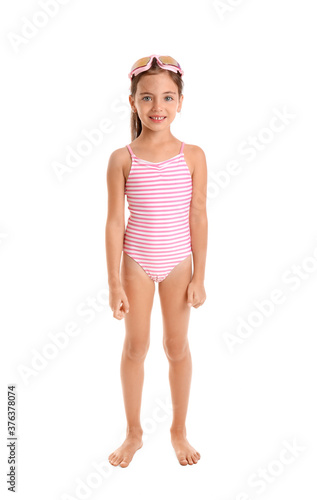 Little girl in swimsuit on ...