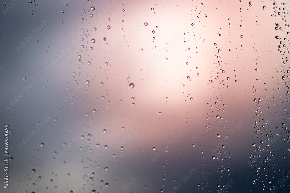 Transparent glass rain drops after a rainy day