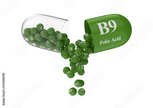 Open capsule with folic acid from which the vitamin composition is pouring
