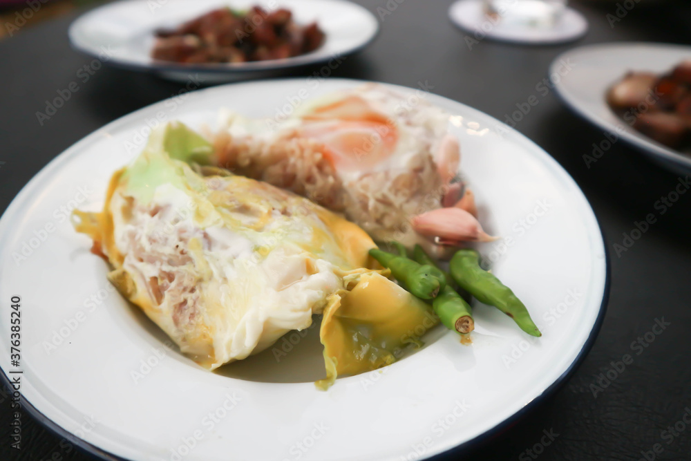 egg with sour pork , steamed egg with pork