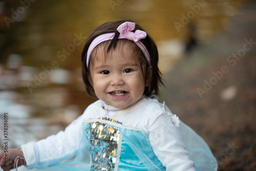 little princes girl playing in the park
