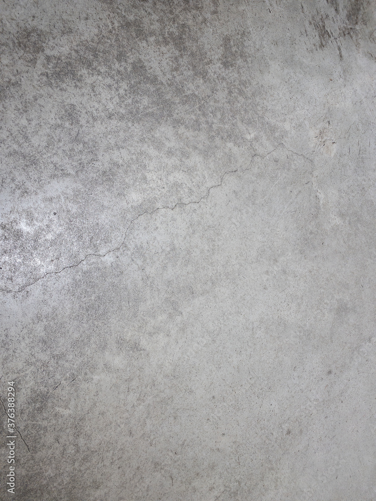 Concrete floor. The texture of the concrete floor for the background. Concrete floor. The texture of the concrete floor for the background.