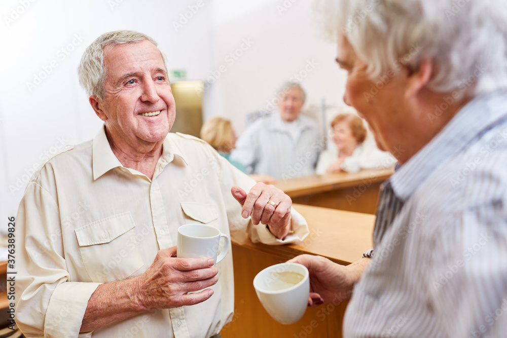 Two seniors talk and flirt with each other Two seniors talk and flirt with each other