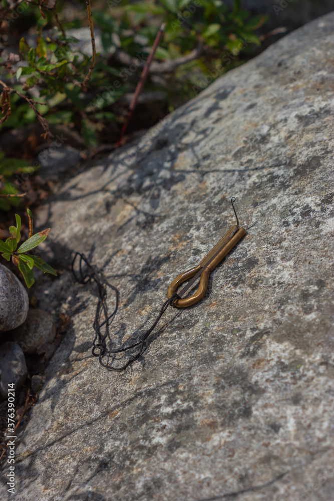 Folk musical instrument jew's harp on the stone One of the most