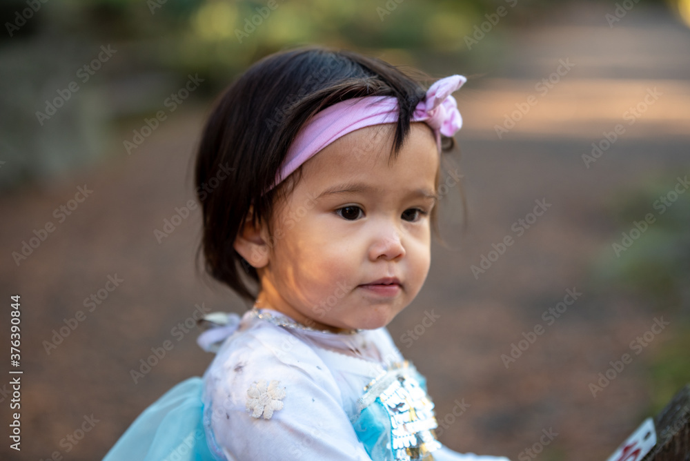 little princes girl playing in the park little princes girl playing in the park