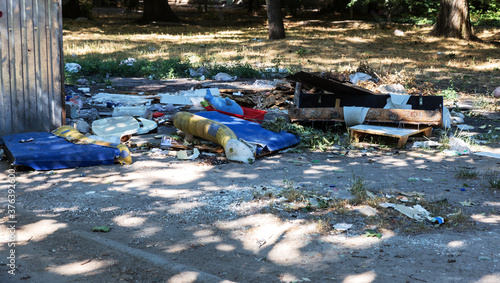 Wallpaper Mural Abandoned solid household garbage on the road. Environmental pollution. Ecological problem. Abandoned garbage on the road. The problem of waste management in a big city. Illegal landfill Torontodigital.ca