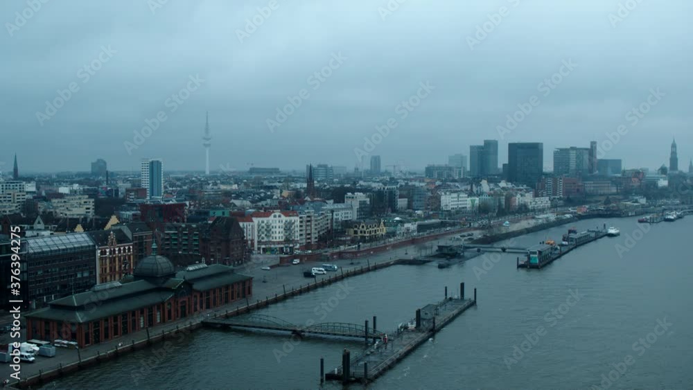 Port of Hamburg and cityscape along Elbe River, Germany Port of Hamburg and cityscape along Elbe River, Germany