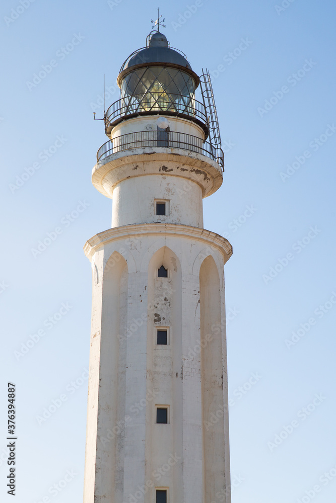 Trafalgar lighthouse in Caños de Meca, Cadiz, Spain. Close-up shot.
