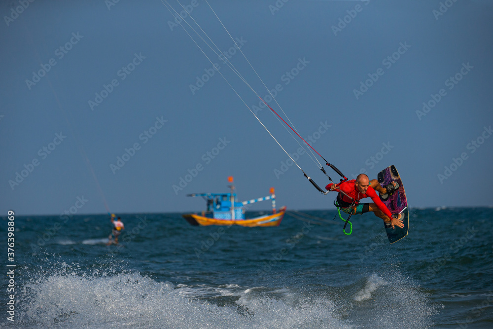 Obraz premium Kitesurfer In Action