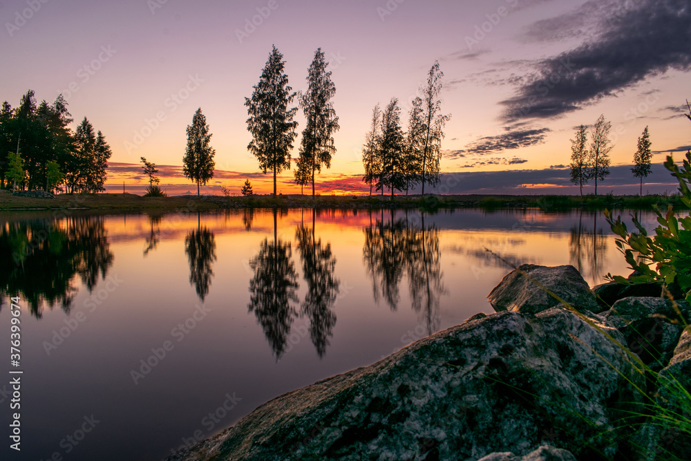 Sunset over the lake Näsijärvi with reflection in Tampere, Finland