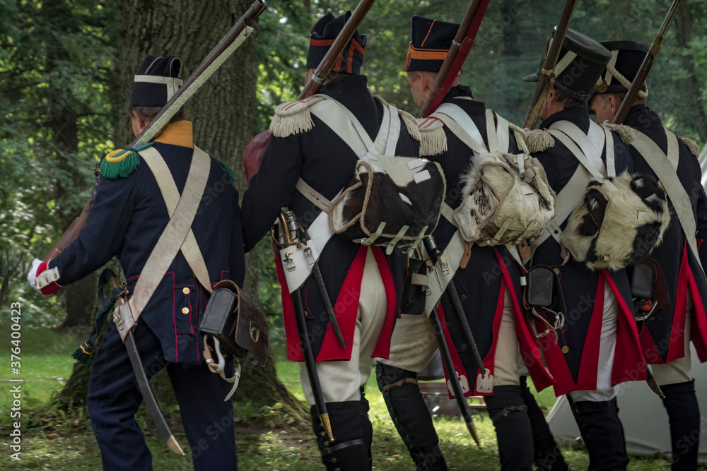 Napoleonic soldiers train to march in the forest