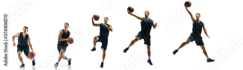 Winner. Young basketball player of team training in action, motion in jump of step-to-step goal isolated on white background. Concept of sport, movement, energy and dynamic, healthy lifestyle. © master1305