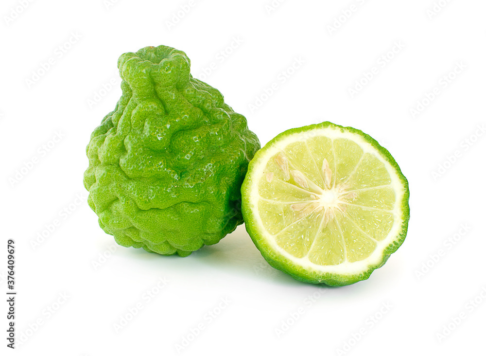 Bergamot fruit with cut in half an isolated on white background.cilpping path Bergamot fruit with cut in half an isolated on white background.cilpping path