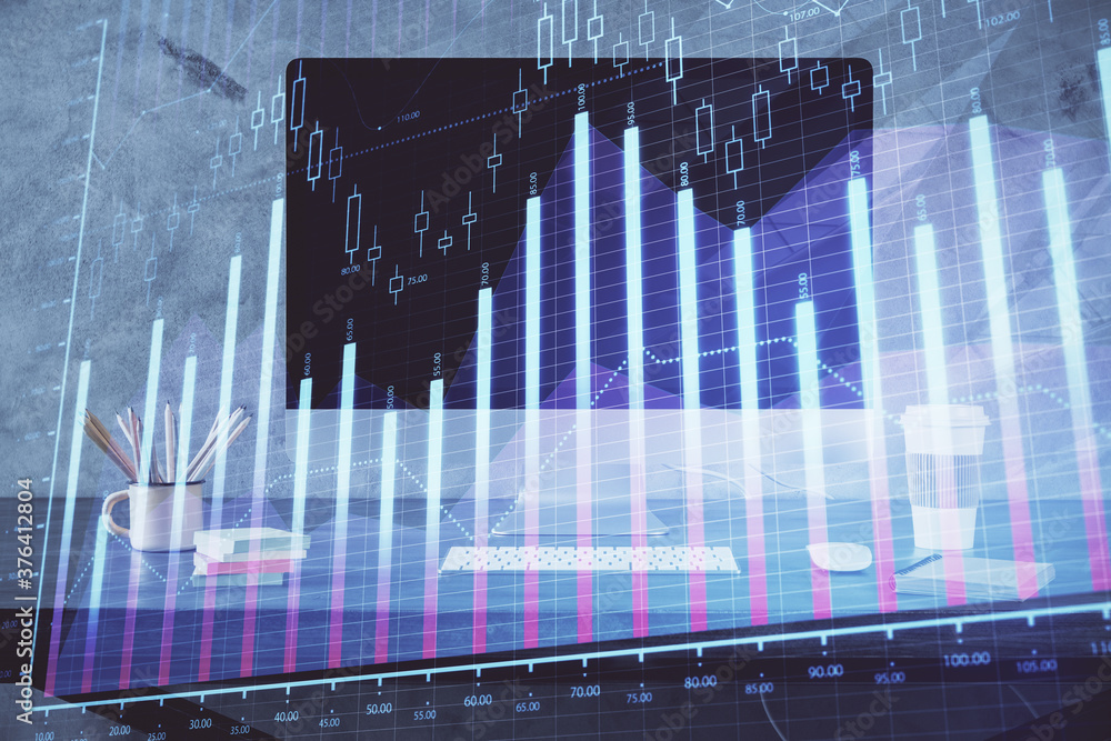 Financial chart drawing and table with computer on background. Double exposure. Concept of international markets. Financial chart drawing and table with computer on background. Double exposure. Concept of international markets.