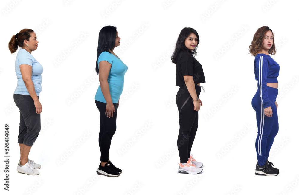 Obraz premium side view of a group of Latin American women with sportswear on white background