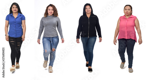 front vieo of a group of latin american women walking on white background photo
