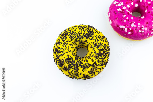 pink doughnut with sprinkles isolated