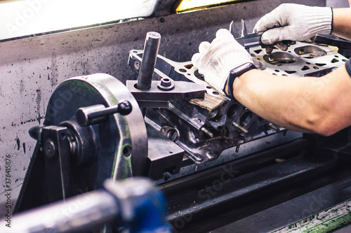 Metal and steel processing on old equipment in the garage.