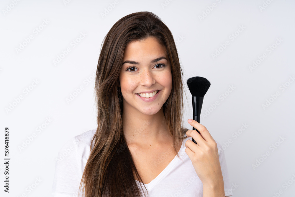 Young teenager Brazilian girl over white background Young teenager Brazilian girl over white background