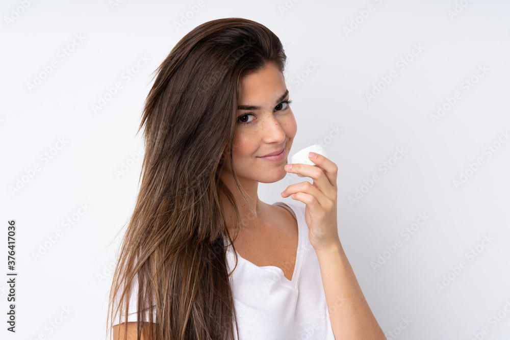 Young teenager Brazilian girl over white background Young teenager Brazilian girl over white background