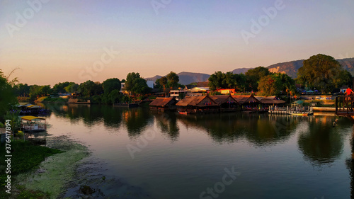 Beautiful houses and hotels along river side in Thailand © Arun