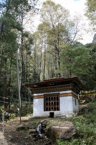 buddhist pavilion in a forest closed to paro (bhutan)