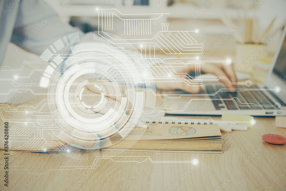 A man working on computer with technology theme drawing. Concept of big data. Multi exposure. A man working on computer with technology theme drawing. Concept of big data. Multi exposure.