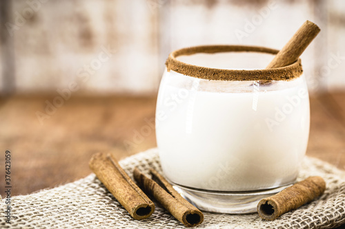 home made Christmas drink typical of the Christmas holiday, sweet eggnog with rum or cognac, called eggnog, coquito, Eierlikör, Crème de Vie or Auld Man's Milk photo