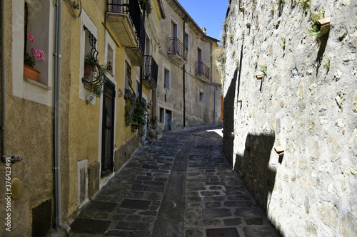 A small road crosses the old buildings of Calvello  a old Town in the Basilicata region  Italy. 