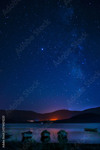 The amazing sky view of Milky Way from Bafa lake is a peaceful place, ringed by traditional villages such as Kapıkırı full of fisherman boats and ruins of Herakleia