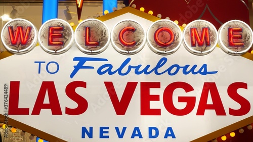 Photography Welcome to fabulous Las Vegas retro neon sign in gambling tourist resort, USA