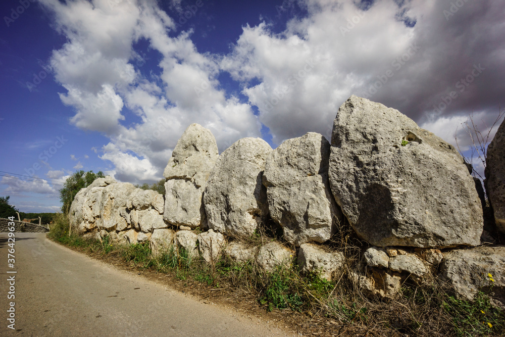 muralla de Es Pou Celat, epoca talayotica (1300-123 a. C.) , restos de un antiguo poblado fortificado, Porreres, Comarca de Es Pla, Mallorca, Spain muralla de Es Pou Celat, epoca talayotica (1300-123 a. C.) , restos de un antiguo poblado fortificado, Porreres, Comarca de Es Pla, Mallorca, Spain