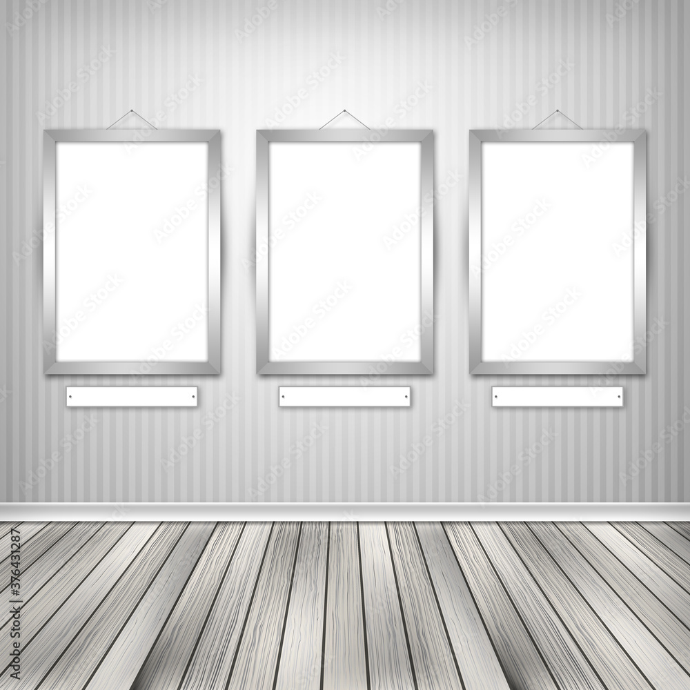Gallery interior with three empty frames on wall. Gallery interior with three empty frames on wall.