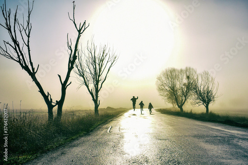 young couple walking on the road