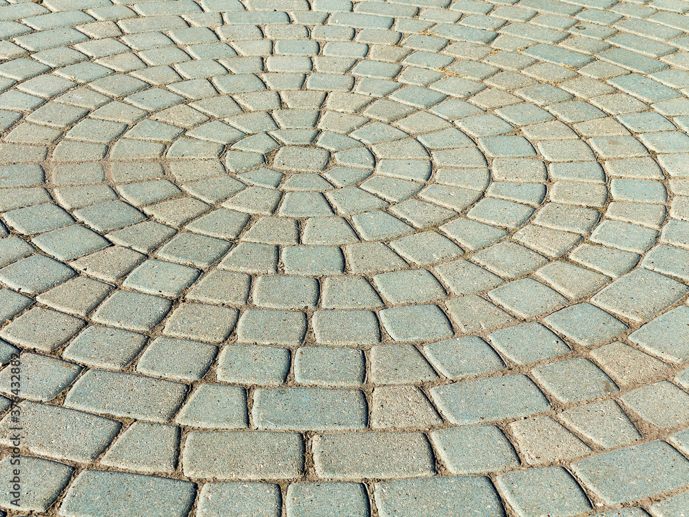 Sidewalk tile. Close-up paving slabs by mosaic. Road paving, construction. Colored concrete paving slab. Diagonal. Sidewalk tile. Close-up paving slabs by mosaic. Road paving, construction. Colored concrete paving slab. Diagonal.