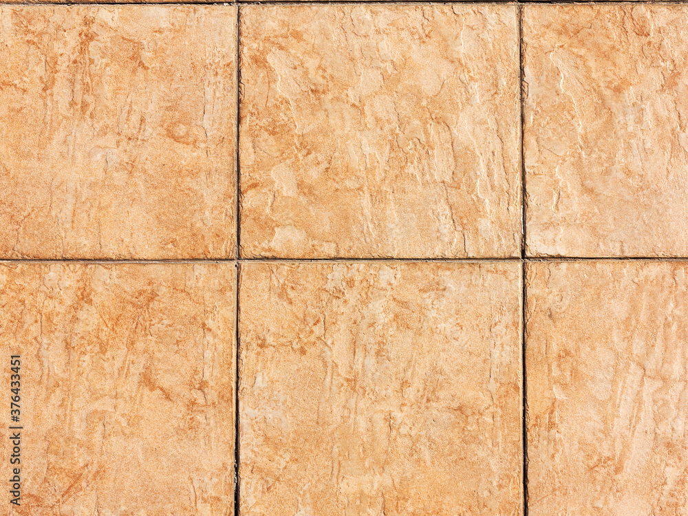 Sidewalk tile. Close-up paving slabs by mosaic. Road paving, construction. Colored concrete paving slab. Sidewalk tile. Close-up paving slabs by mosaic. Road paving, construction. Colored concrete paving slab.