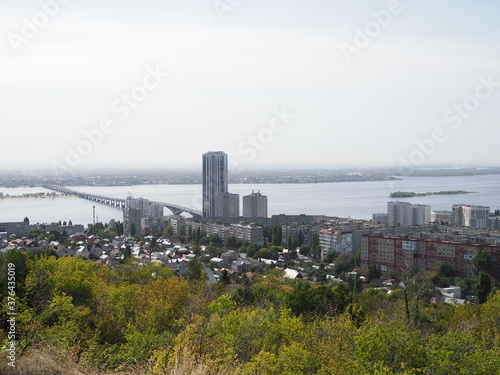 beautiful landscape of river Volga with bridge and view on Saratov and Engels