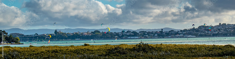 kitesurfers at the beach