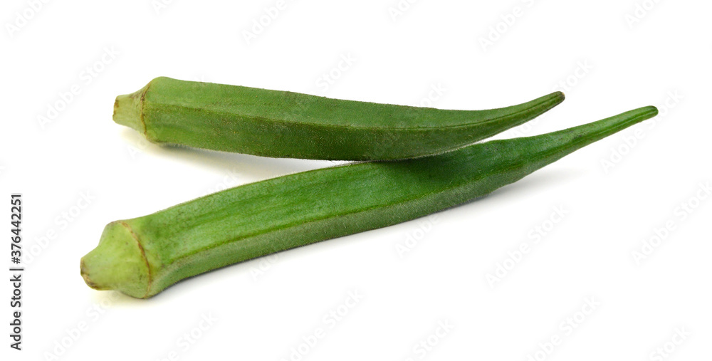 Fresh raw okra isolated on white background, horizontal with copy space Fresh raw okra isolated on white background, horizontal with copy space