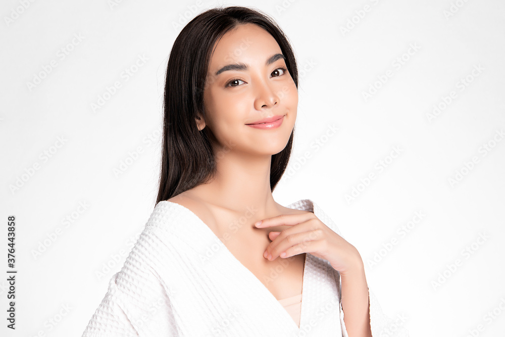Beautiful Young asian Woman with Clean Fresh Skin on white background, Face care, Facial treatment, Cosmetology, beauty and spa, Asian women portrait Beautiful Young asian Woman with Clean Fresh Skin on white background, Face care, Facial treatment, Cosmetology, beauty and spa, Asian women portrait
