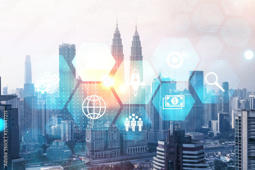 Research and development hologram over panorama city view of Kuala Lumpur. KL is hub of new technologies to optimize business in Malaysia, Asia. Concept of exceeding opportunities. Double exposure. Research and development hologram over panorama city view of Kuala Lumpur. KL is hub of new technologies to optimize business in Malaysia, Asia. Concept of exceeding opportunities. Double exposure.