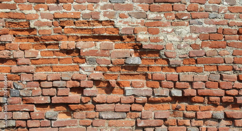 Muro in mattoni, vintage e danneggiato