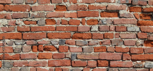 Muro in mattoni, vintage e danneggiato