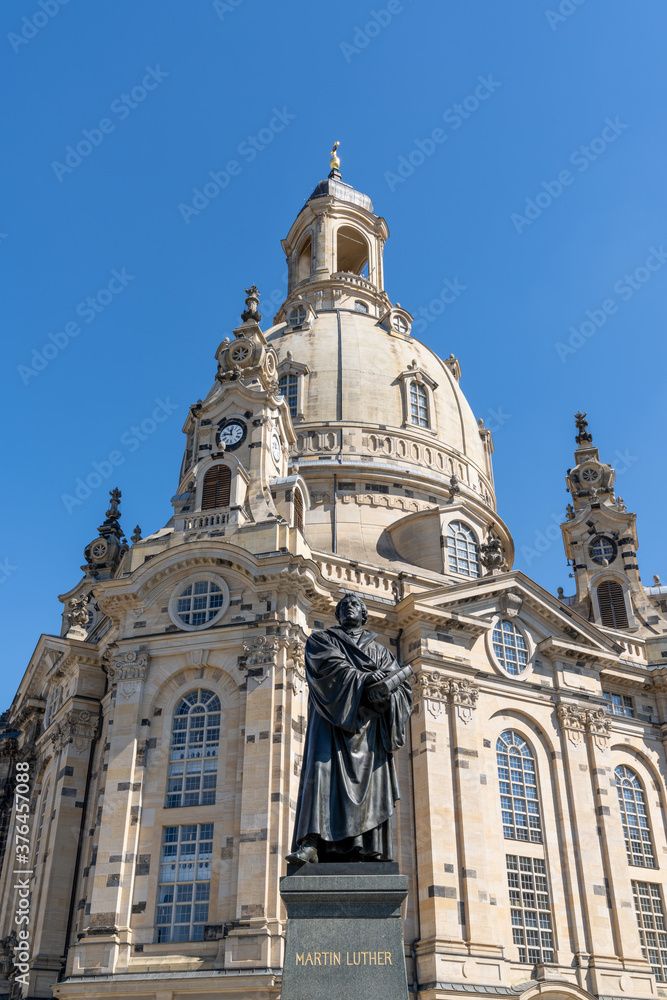 close up view of Martin Luther statue and Frauenkirche in Dresden
