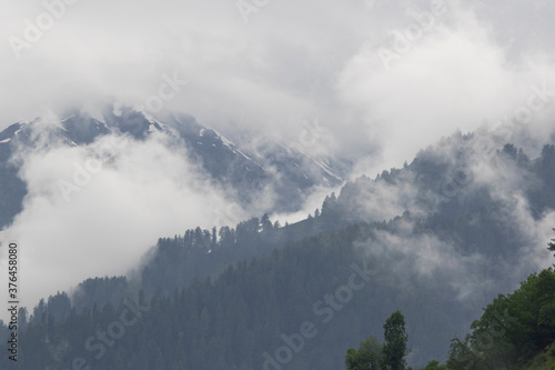 clouds on the mountains in Neealm valley , Kashmir, Pakistan  photo