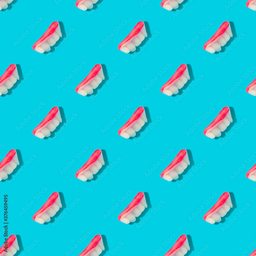 Vampire teeth seamless pattern. Halloween background jaw on blue. Vampire teeth seamless pattern. Halloween background jaw on blue.