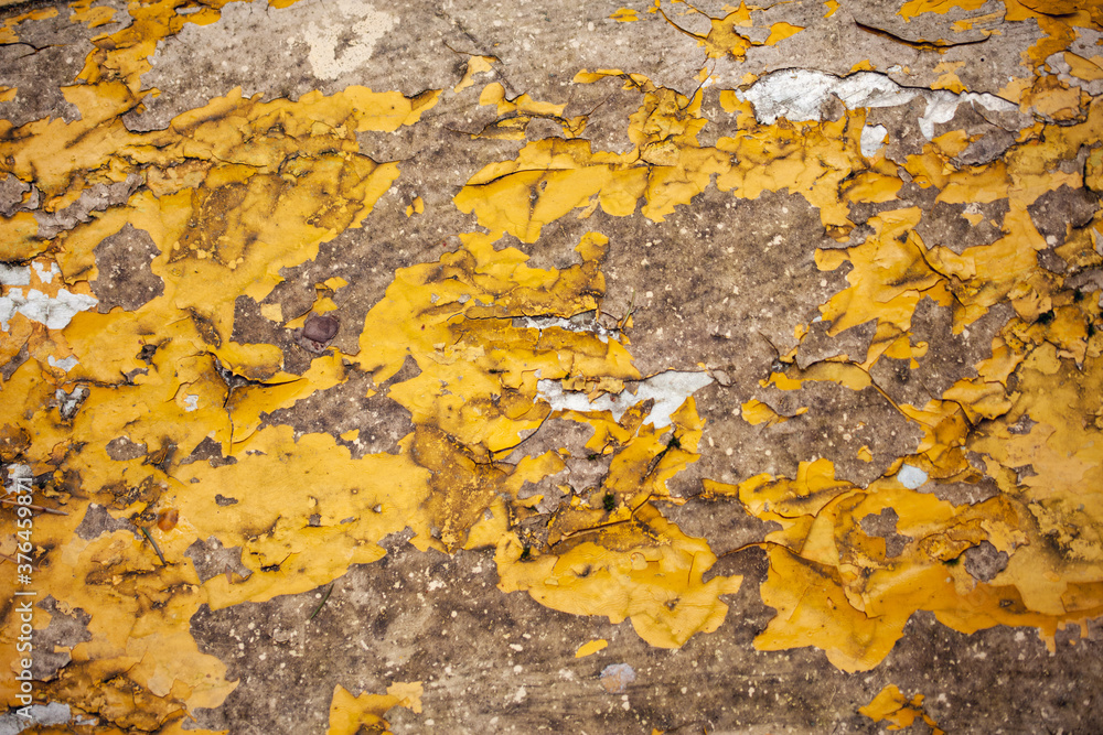 Old peeling paint on wall. Grunge texture. Old grunge background. Old peeling paint on wall. Grunge texture. Old grunge background.