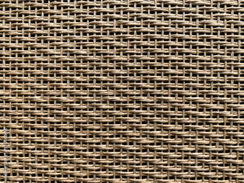 brown cream speaker grill look Like woven bamboo can use for background, backdrop and texture with copy space for letter. concept for instrumental.